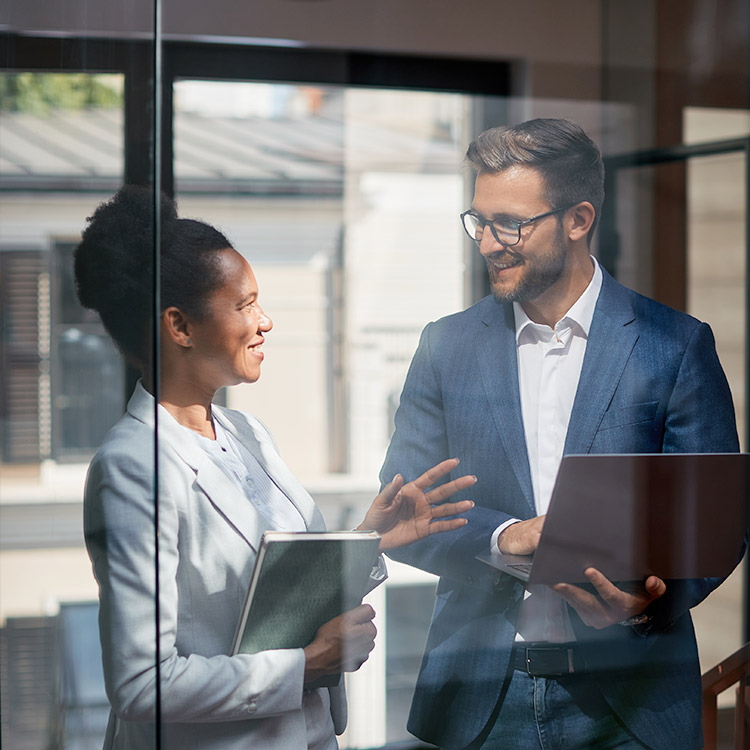 A man providing his client with dedicated financial service