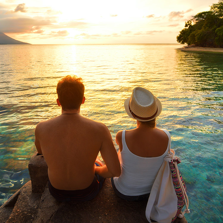A couple enjoying life on vacation due to successful financial planning